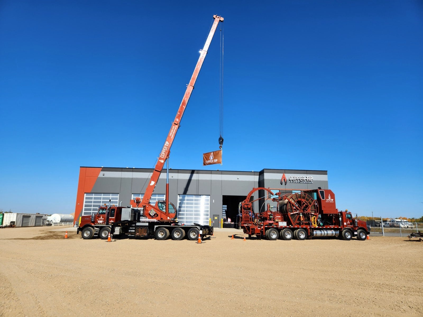 Copper Tip Energy Services head office with equipment staged out front